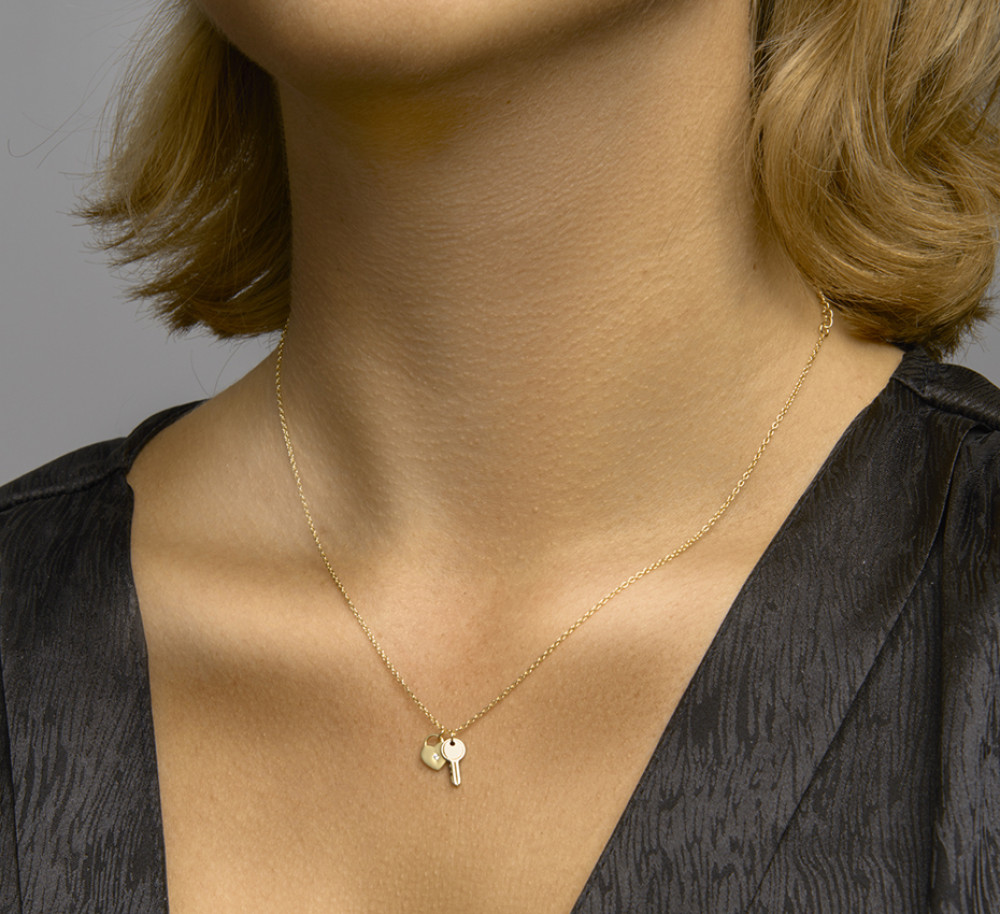 hartvormige-collier-met-hanger-goud-op-zilver-lengte-verstelbaar-41-45-cm