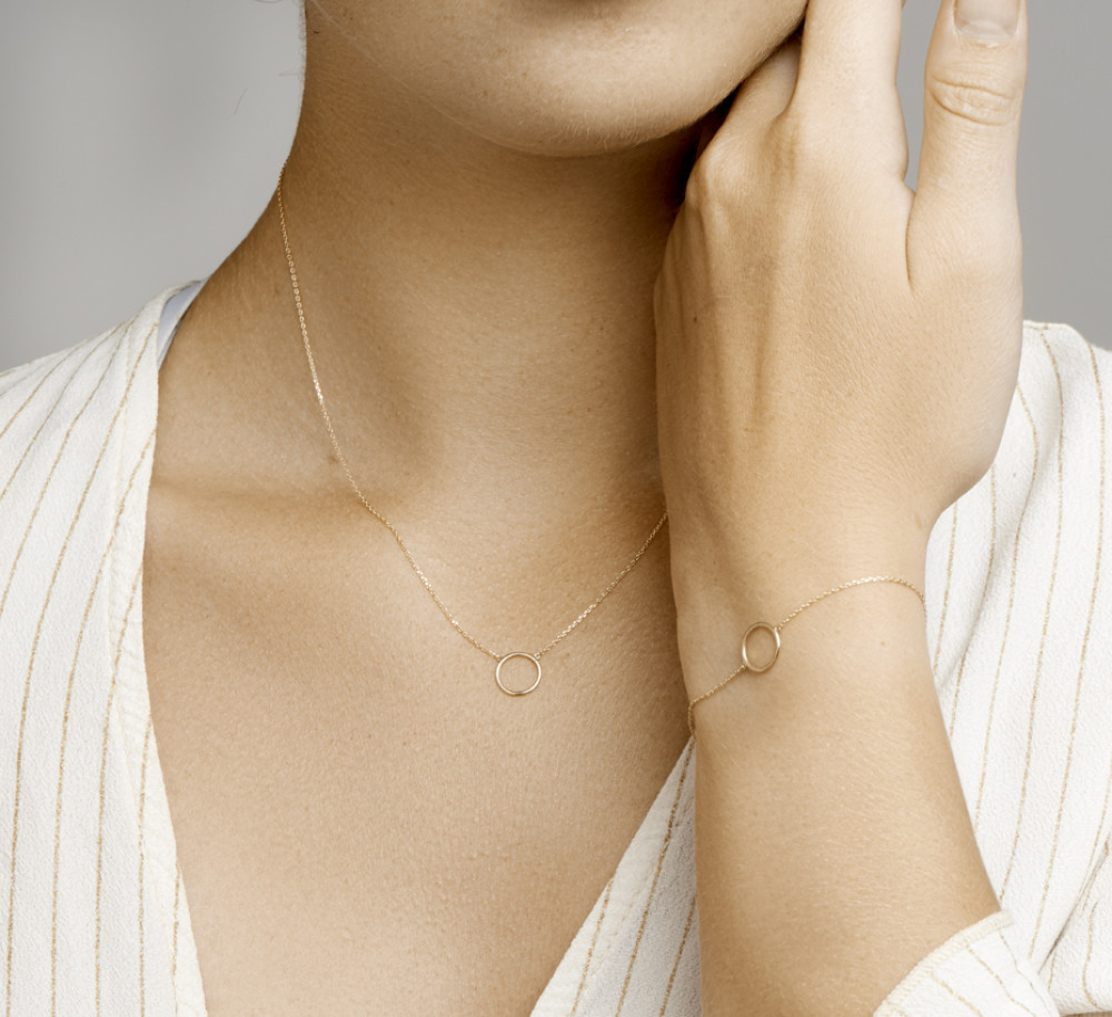 14-karaat-gouden-armband-met-opengewerkte-ronde-hanger-lengte-16-5-cm-17-5-cm-18-5-cm