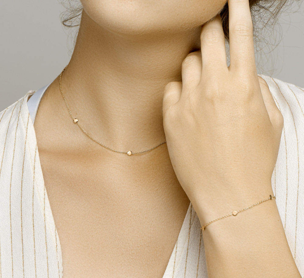 14-karaat-gouden-schakelarmband-met-ronde-hangers-lengte-17-cm-19-cm