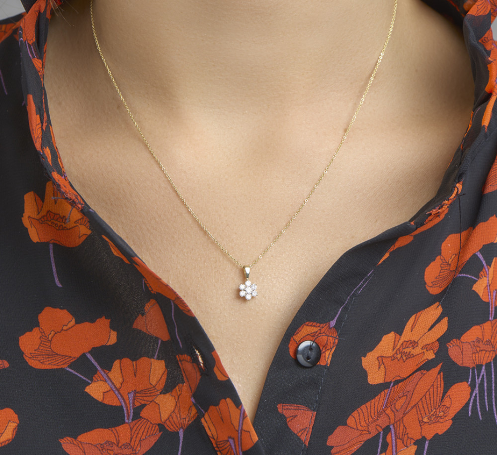 bloem-hanger-van-14-karaat-goud-met-7-zirkonia-s-hoogte-14-mm