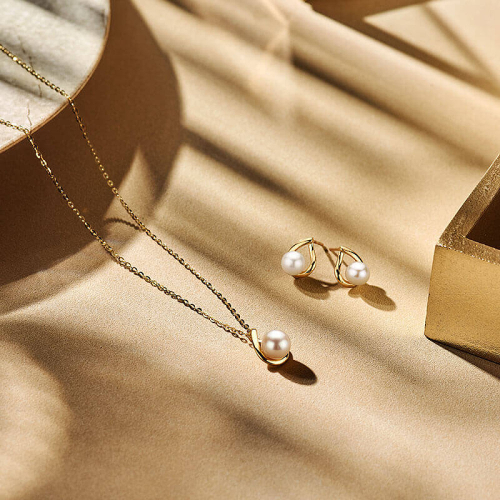 witte-zoetwaterparelketting-1-mm-goud-lengte-verstelbaar-41-45-cm