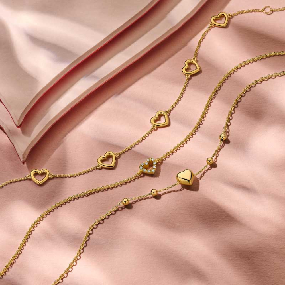 14-karaat-gouden-armband-met-hartjeshanger-en-bolletjespatroon