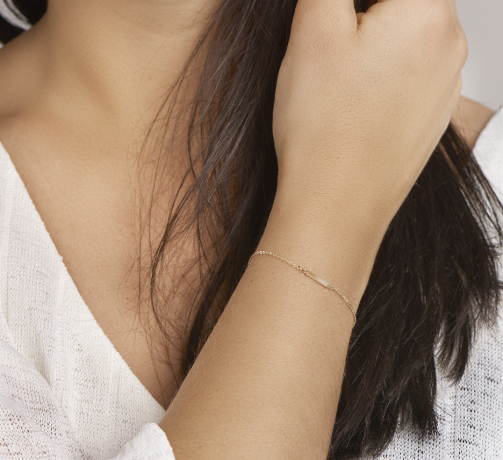 14-karaat-gouden-schakelarmband-met-graveerbaar-balkje