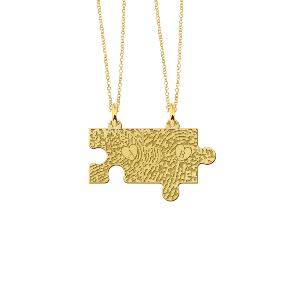 gouden-puzzelstuk-hanger-set-met-initialen-en-vingerafdruk