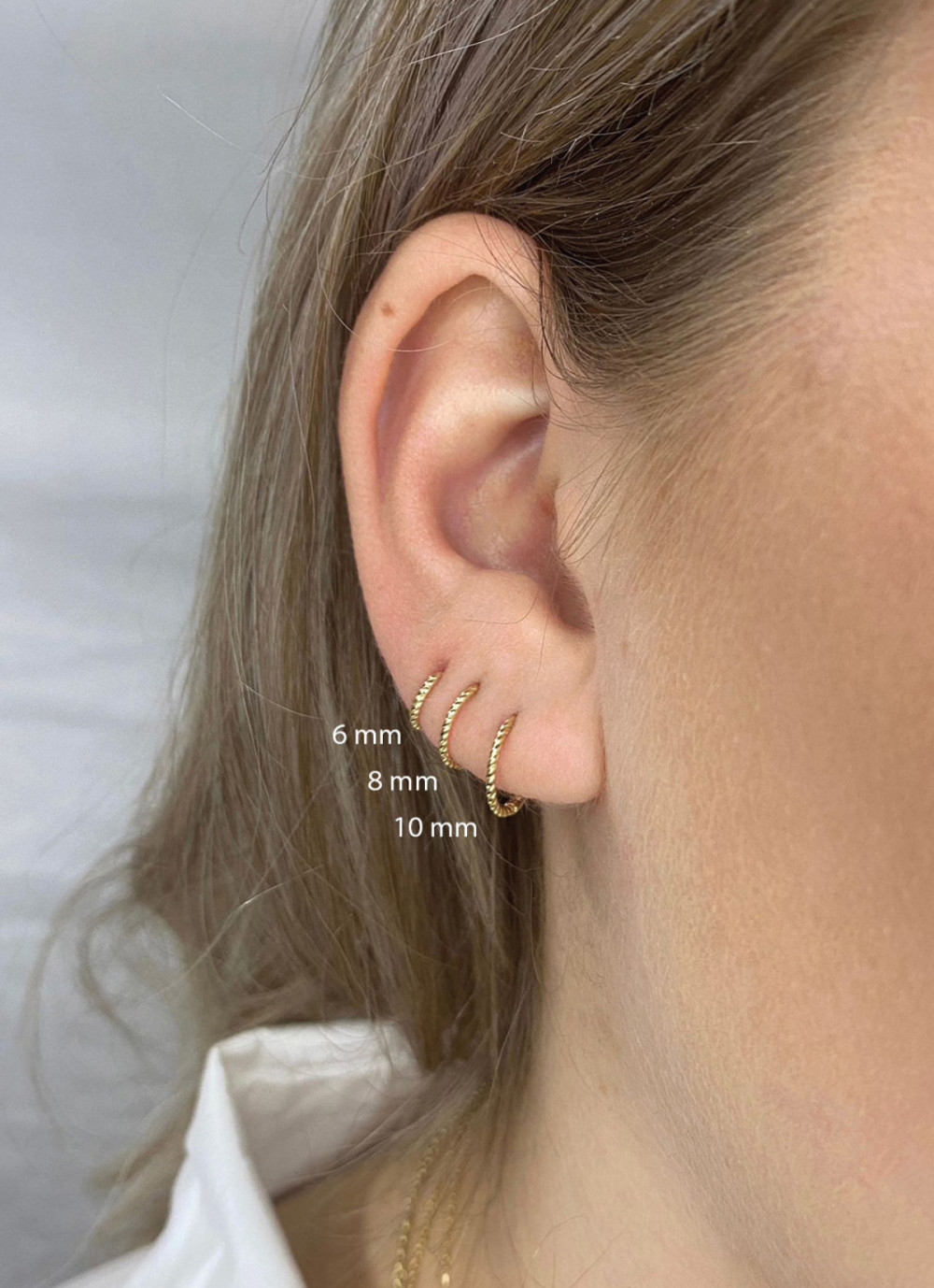 jackie-gold-jke22140-oorringen-van-14-karaat-goud-met-een-twist-6-mm-diameter