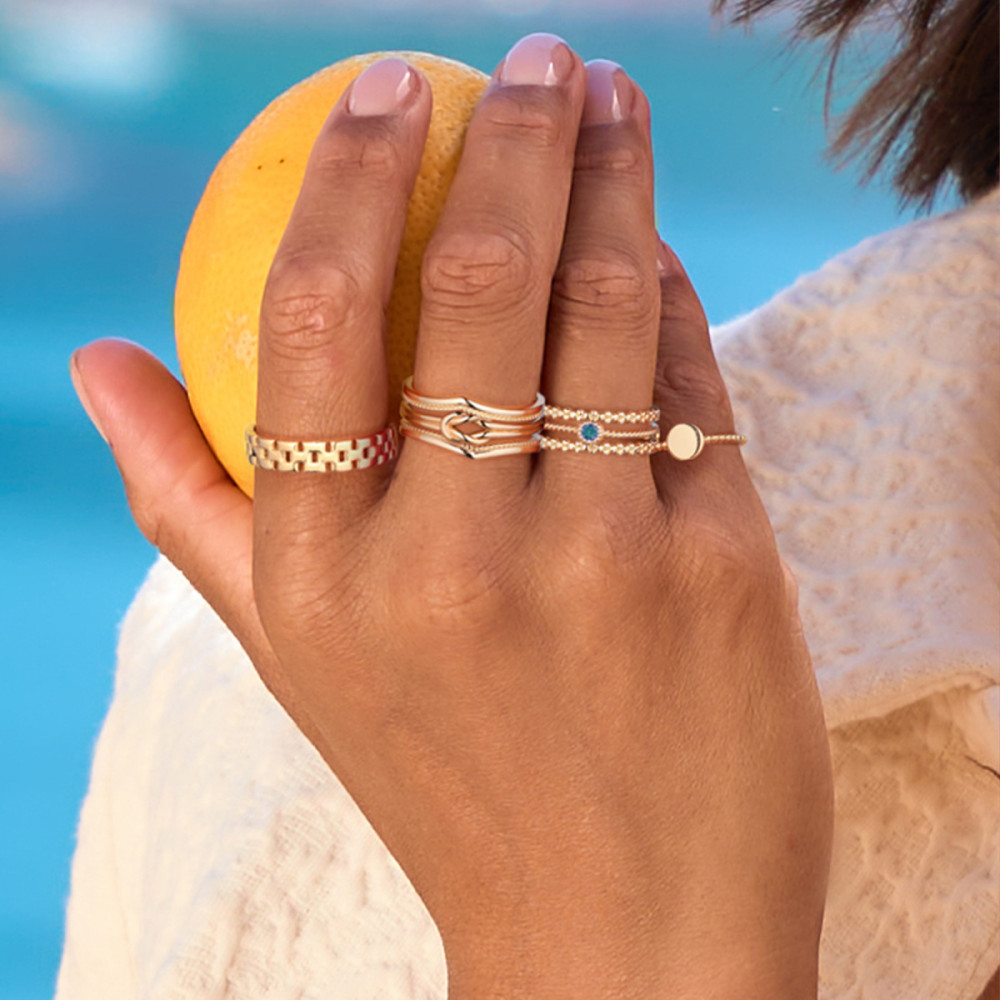jackie-gold-jkr25-512-ronde-ring-met-14-karaat-gouden-gedraaide-band-en-blauwe-topaas