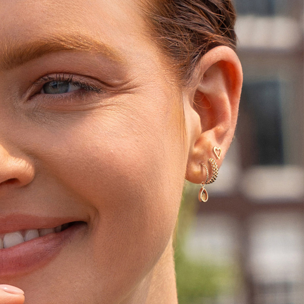 jackie-gold-jks25560-gedraaide-gouden-oorring-met-peer-geslepen-citrien-van-6-mm-per-stuk