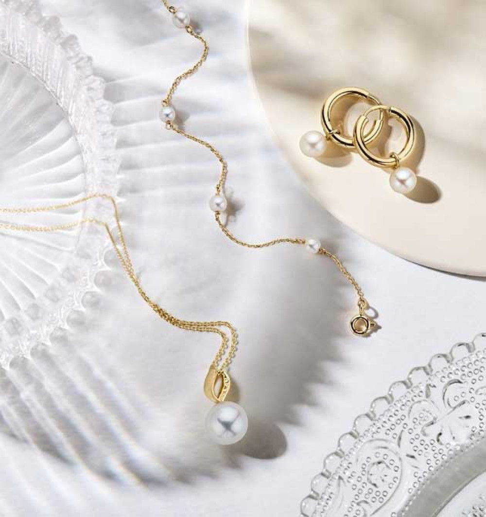 gouden-creolen-met-parel-hangers-14-karaat-zoetwaterparel