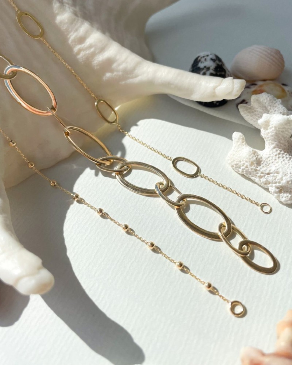 14-karaat-gouden-schakelarmband-met-opengewerkte-ovalen