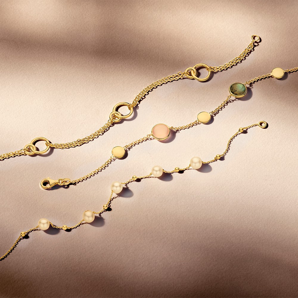 14-karaat-gouden-schakelarmband-met-opengewerkte-rondjes