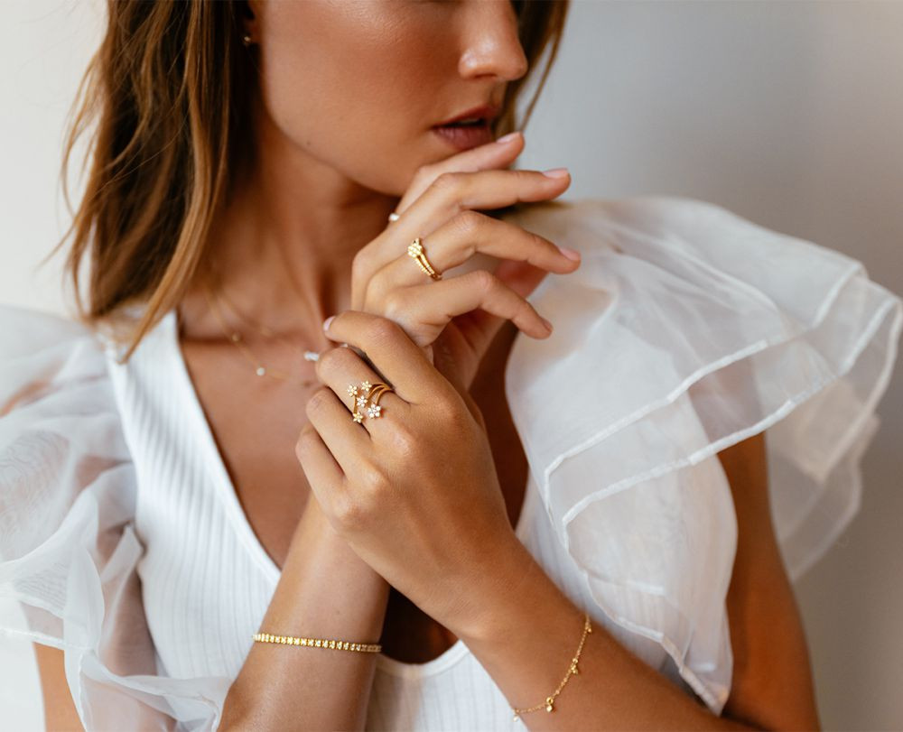 14-karaat-gouden-schakelarmband-met-ronde-bedeltjes-en-diamanten