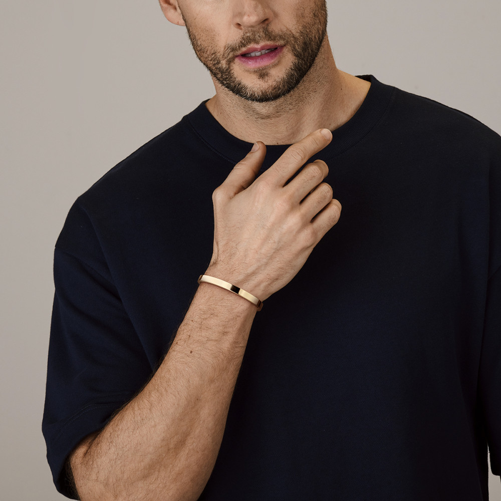 14-karaat-gouden-slavenarmband-met-glanzende-afwerking-en-vlakke-buis-6-mm