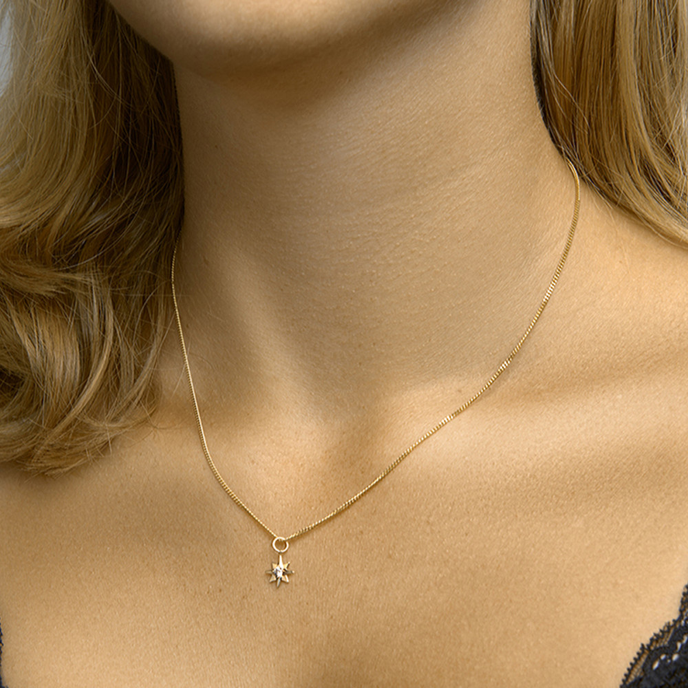 14-karaat-gouden-ster-hanger-met-zirkonia-9-mm-breed-hoogte-15-mm