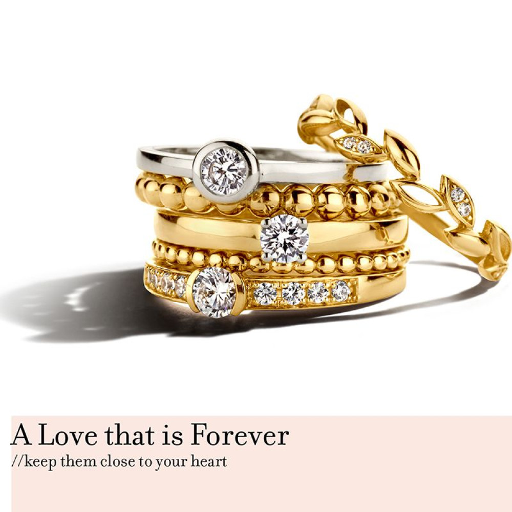 14-karaat-witgouden-solitair-ring-met-zirkonia-in-bezel-zetting