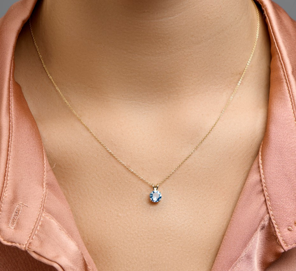 blauwe-topaas-hanger-van-14-karaat-goud-hoogte-10-5-mm