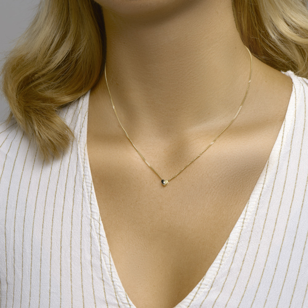 glanzende-gouden-hart-hanger-met-zirkonia-in-het-midden-5-5-mm-breed-hoogte-5-mm