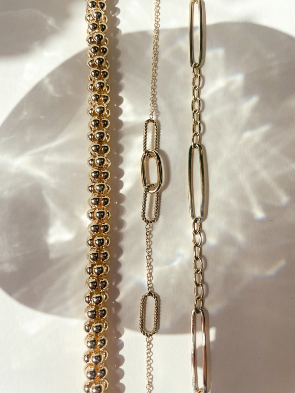 gouden-armband-met-vier-opvallende-ovale-schakels-lengte-19-cm