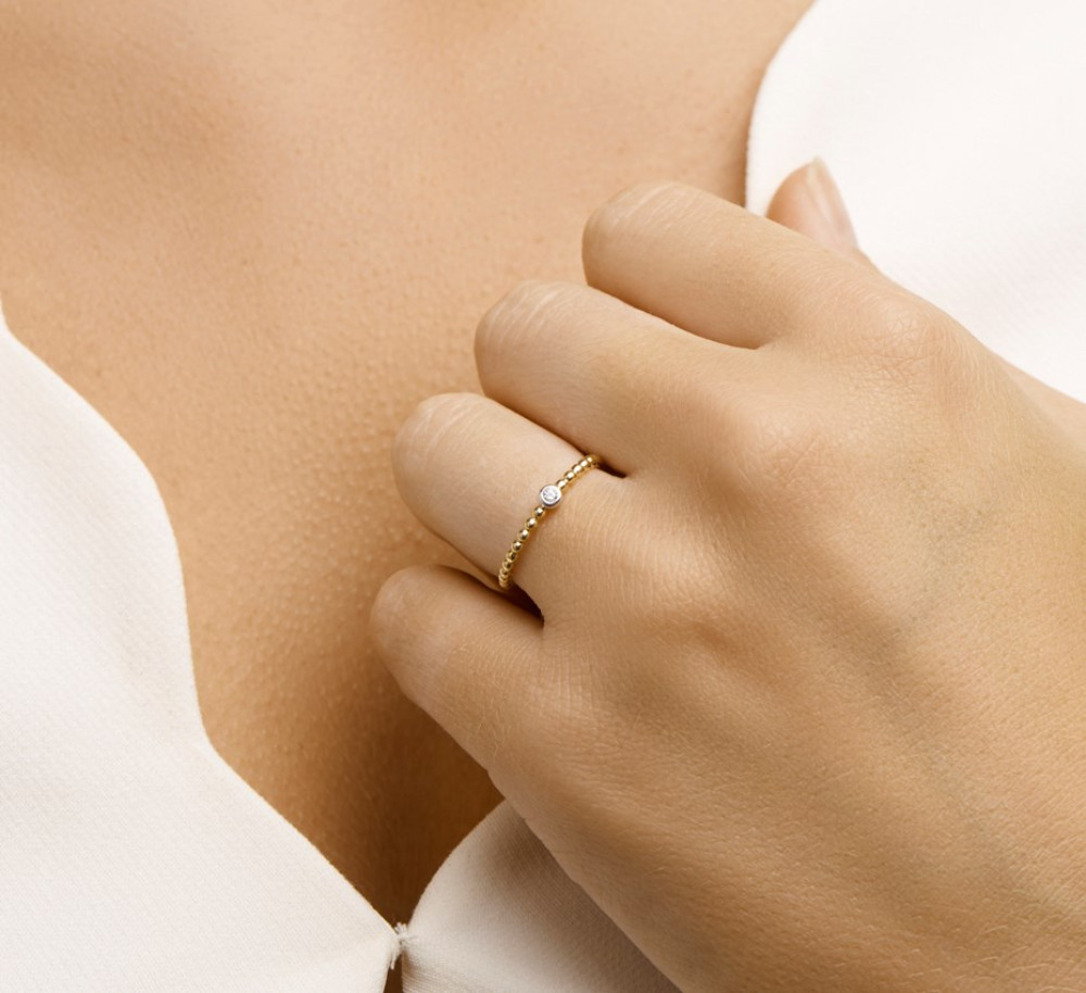 gouden-bolletjesring-met-centrale-zirkonia