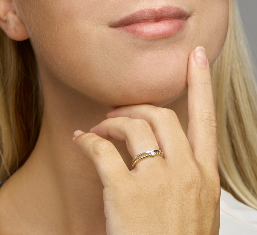 gouden-bolletjesring-met-centrale-zirkonia