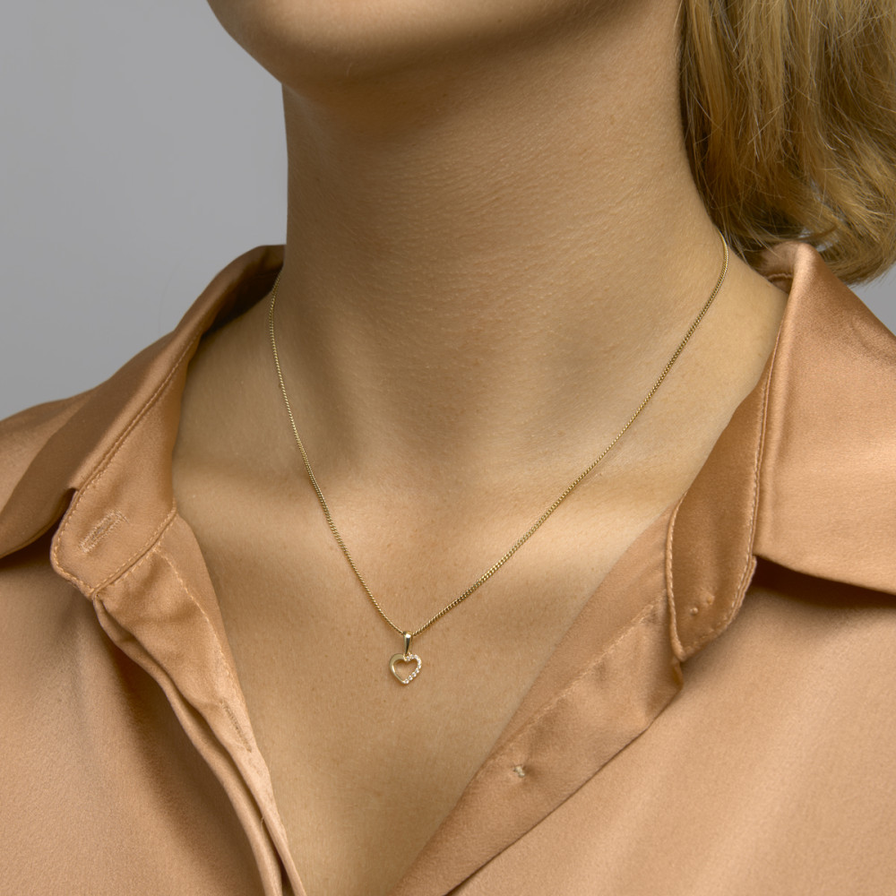 gouden-hartjes-hanger-helft-glad-helft-zirkonia-s-8-5-mm-breed-hoogte-14-mm