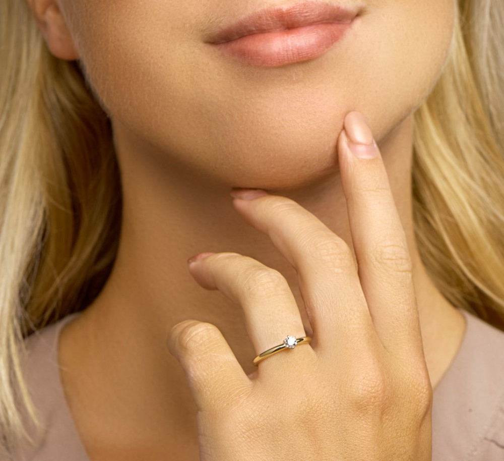 klassieke-solitair-ring-van-14-karaat-bicolor-goud-met-centrale-diamant-van-0-2-crt