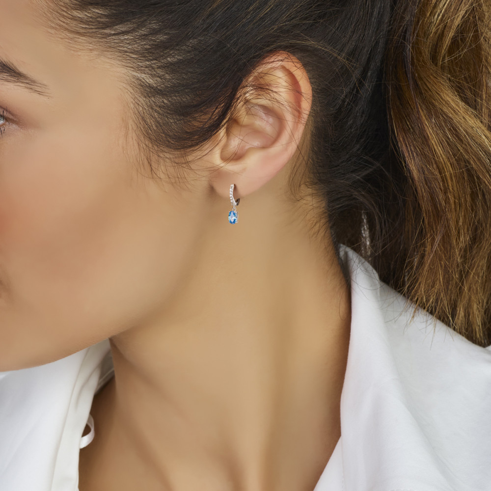 oorringen-blauwe-zirkonia-hangers-ovaal-zilver-925-glanzend-19-mm-hoog