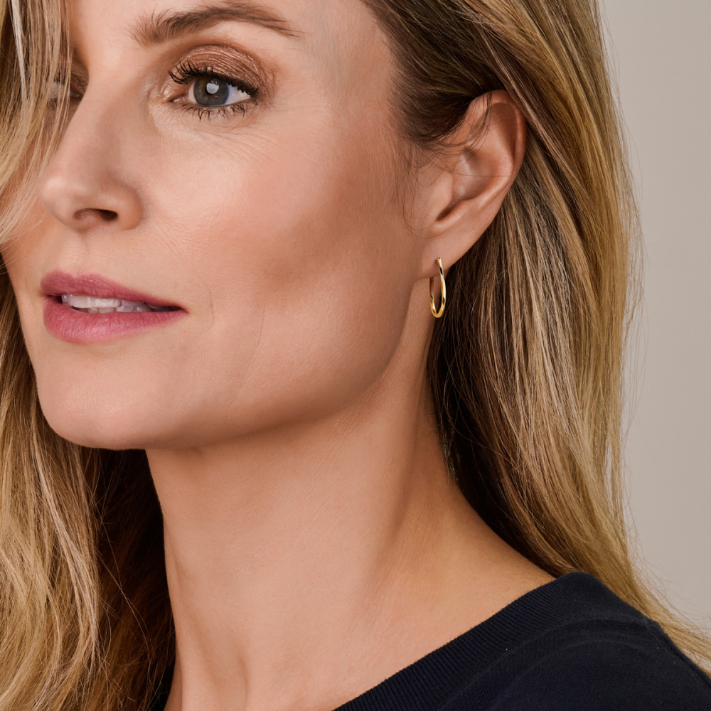 ovale-oorringen-goud-gedraaid-hoogte-28-mm