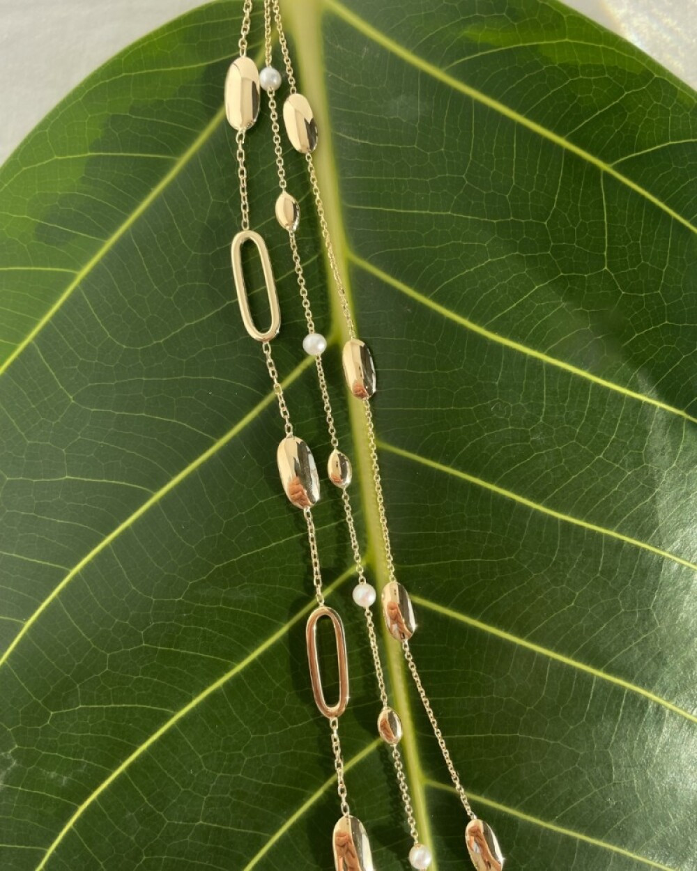 ovale-schakelarmband-van-14-karaat-glanzend-goud-en-5-mm-breed-lengte-19-cm