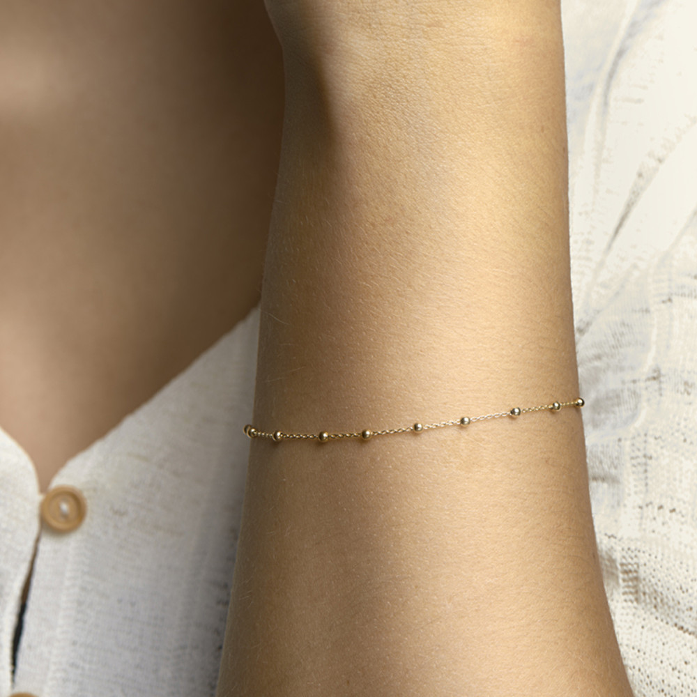 schakelarmband-anker-goud-glanzend-2-3-mm-breedte-lengte-18-cm