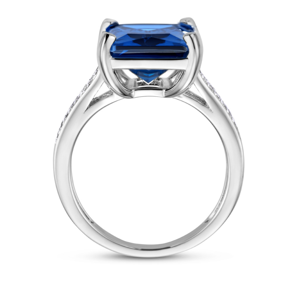 zilveren-gerhodineerde-entourage-ring-met-blauwe-zirkonia