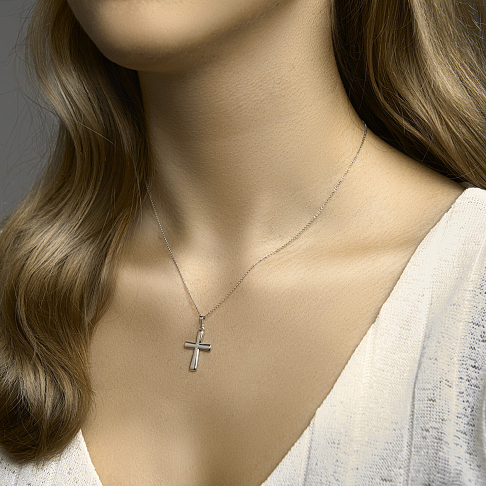 zilveren-kruisje-met-sierlijk-gebogen-randen-16-mm-breed-hoogte-29-mm