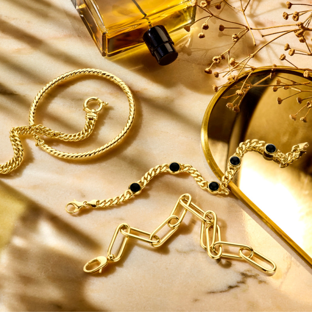 14-karaat-gouden-slavenarmband-met-gedraaid-patroon-en-scharniersluiting
