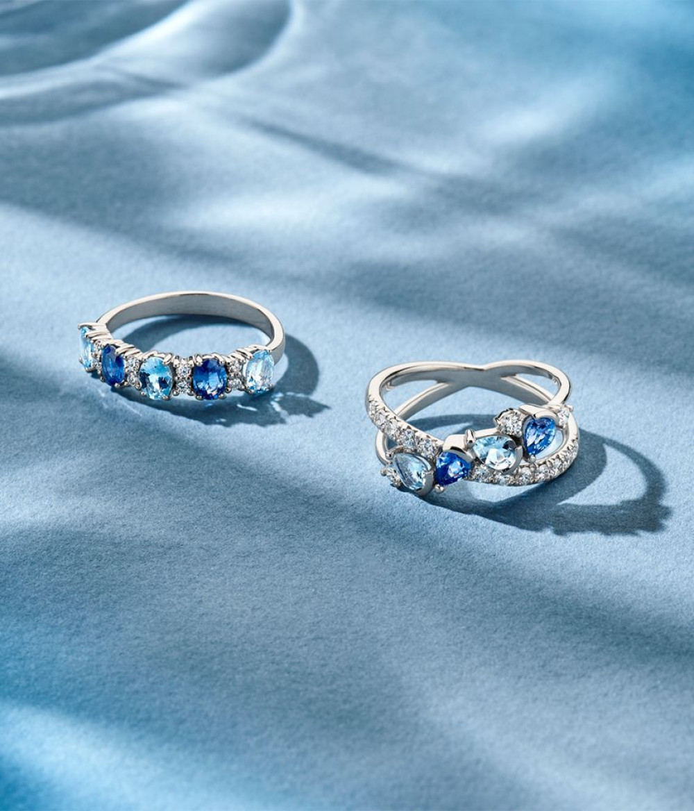 18-karaat-witgouden-meer-steense-ring-met-saffier-aquamarijn-en-diamant