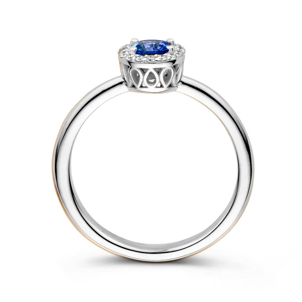 ronde-entourage-ring-van-18-karaat-witgoud-met-blauwe-saffier-en-diamanten