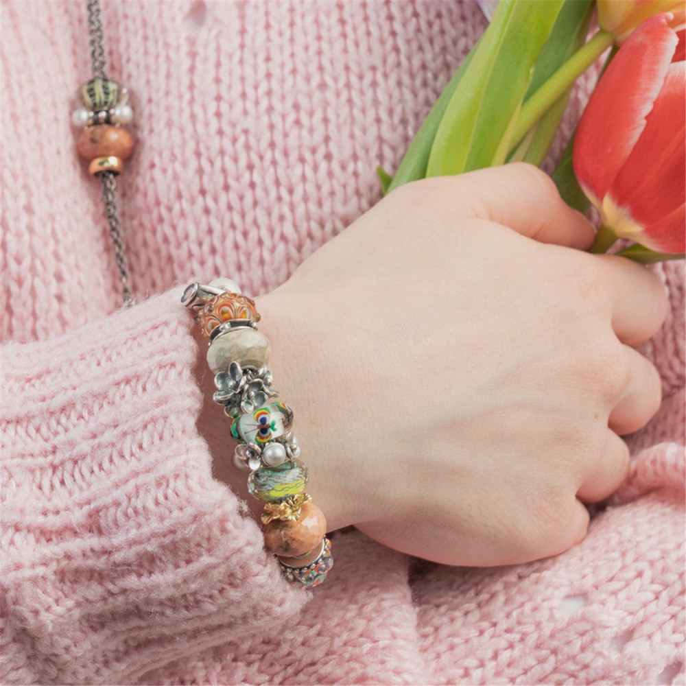 trollbeads-tagbe-00308-zilveren-bloemenkrans-parels-van-geduld-bedel-met-witte-parel