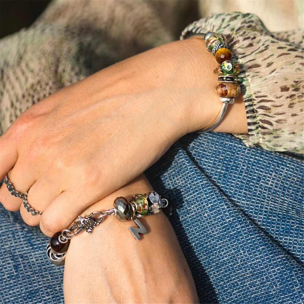 trollbeads-zilveren-ring-met-bloemen-schakels