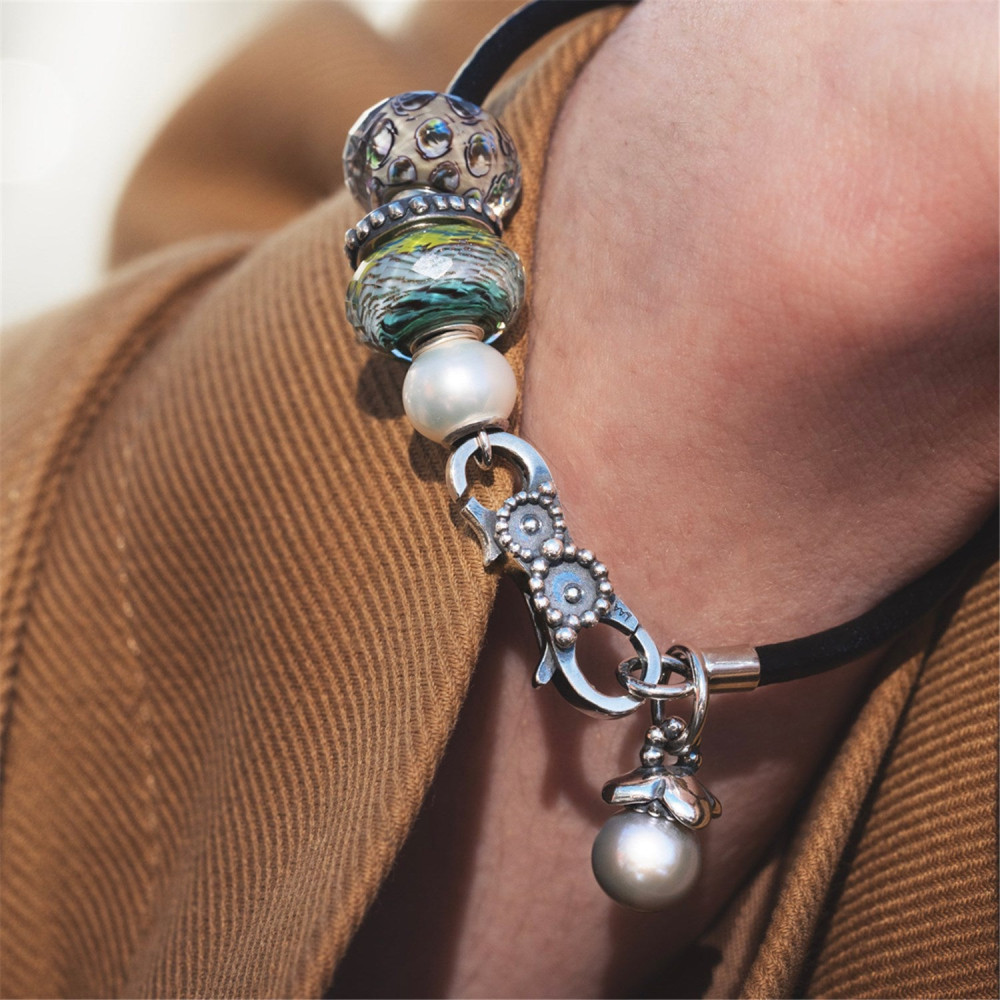 trollbeads-stroom-des-levens-tglbe-30132-glazen-kraal-met-geometrisch-patroon-en-gouden-accenten