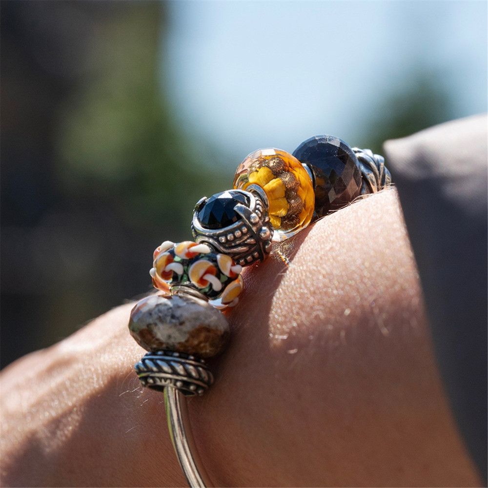 trollbeads-tglbe-20424-glazen-bedel-met-abstracte-bloemen-en-bladeren-in-zwart-groen-oranje-en-wit
