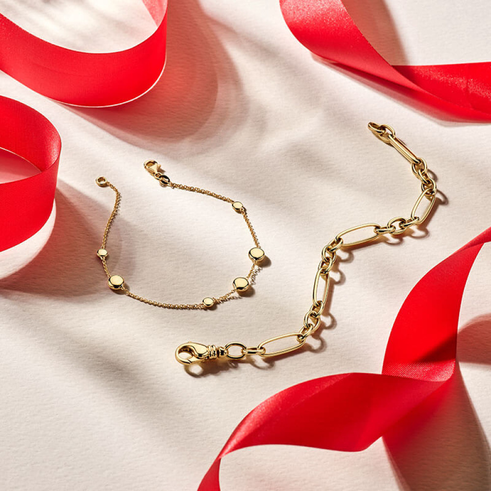 gouden-schakelarmband-met-afwisselend-patroon