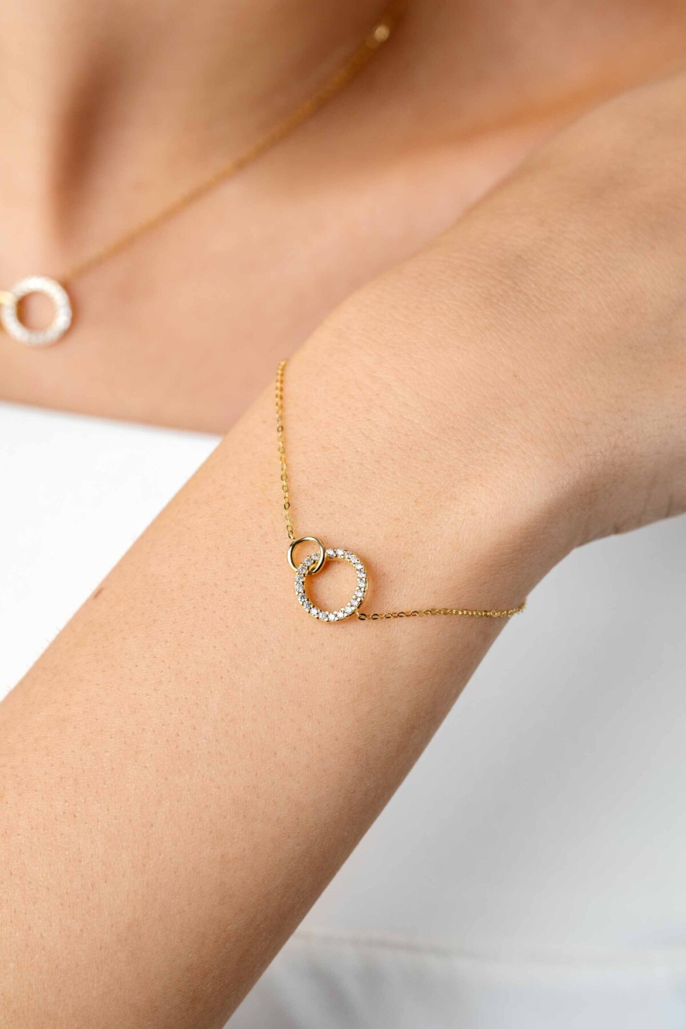 zinzi-zga460-armband-goud-zirkonia-en-2-open-rondjes-11-mm-breedte-lengte-16-5-19-5-cm