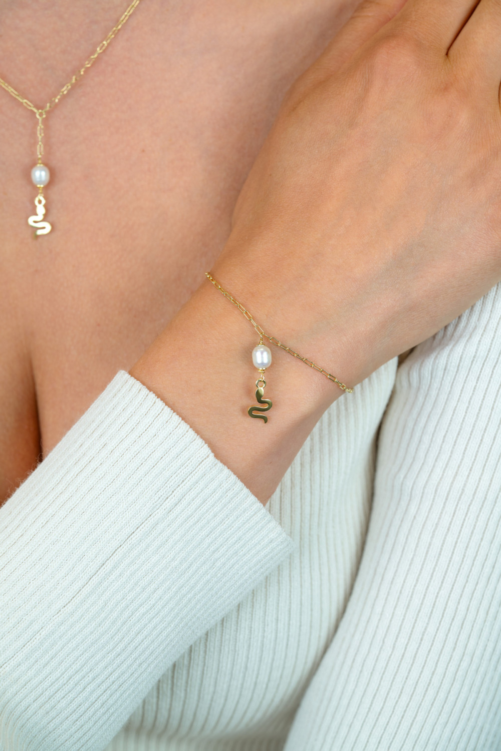 zinzi-zia2761-slang-armband-gold-plated-witte-parel-24-mm-breedte-lengte-17-20-cm
