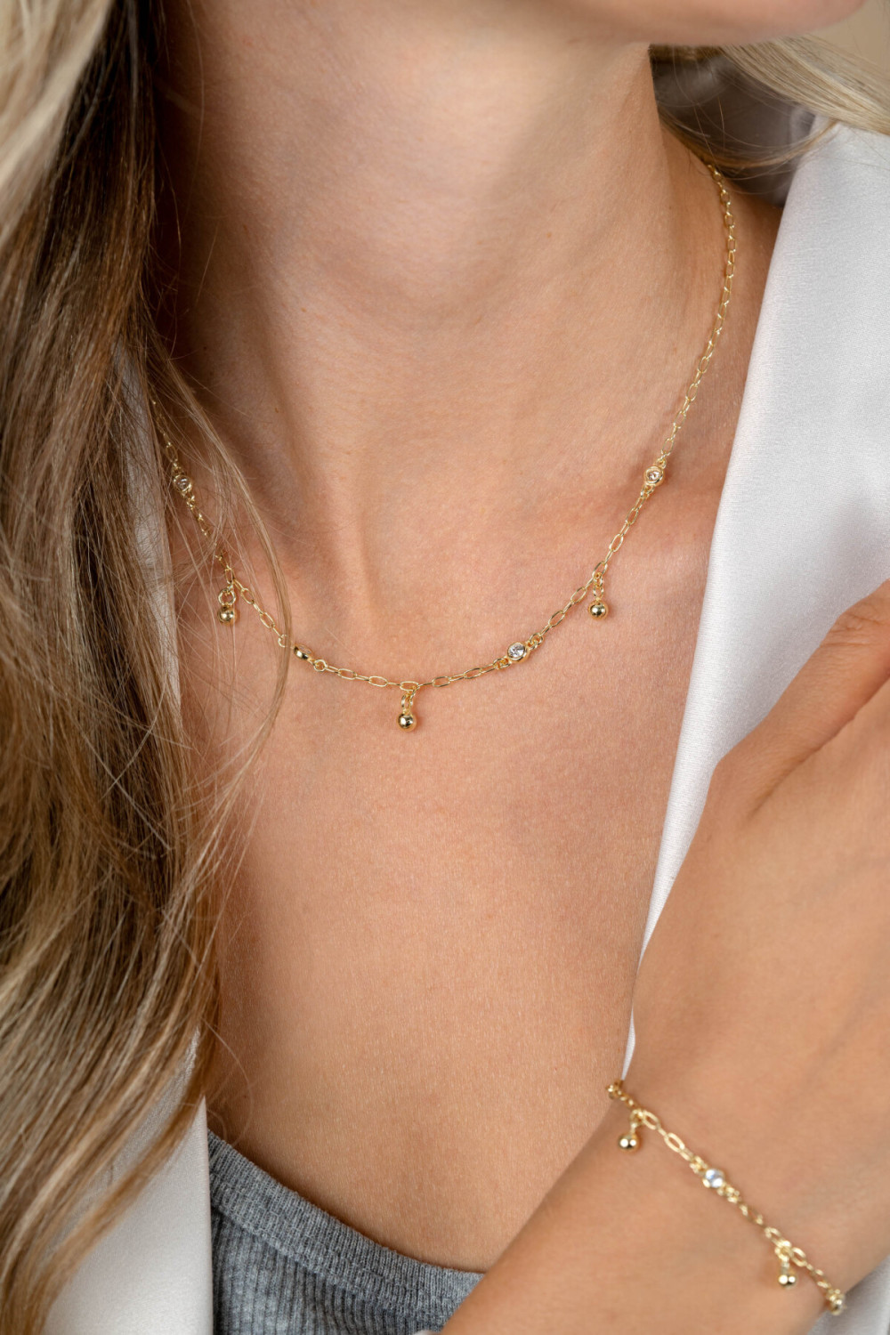 zinzi-zic2658-schakelketting-goudkleurig-zirkonia-met-drie-bolletjes-lengte-42-45-cm